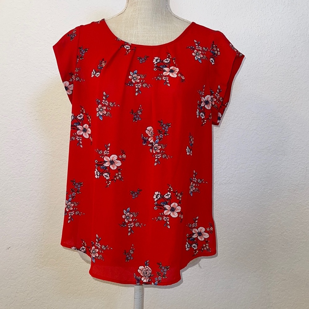 Red floral woman’s top